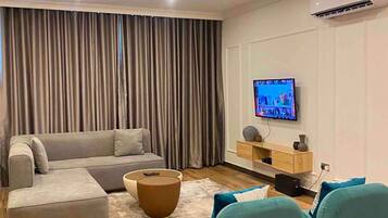 Superior Room | Living area | Flat-screen TV