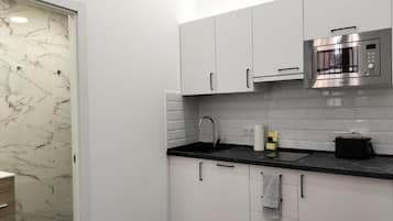 Apartment | Private kitchen | Full-size fridge, microwave, stovetop, dishwasher