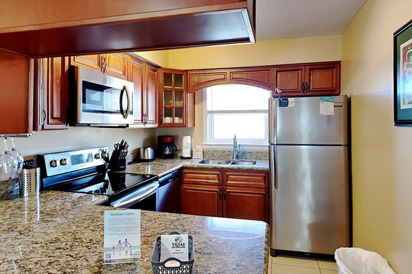 Coffee/tea maker, fridge, microwave, oven