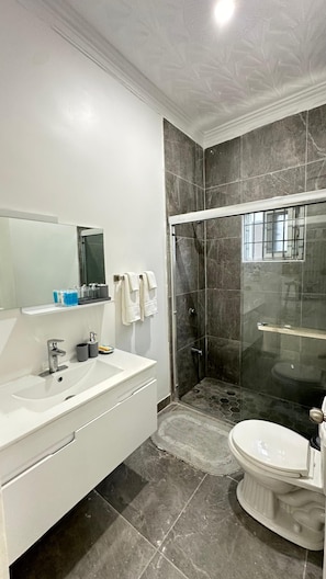 Shower, towels, soap, shampoo