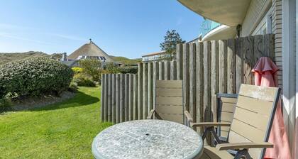 Am Fuße der Dünen liegt die schöne Ferienwohnung Strandslag 95.