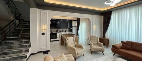 Exclusive Villa | Living room | Flat-screen TV, heated floors