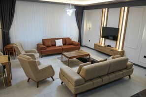 Exclusive Villa, 3 Bedrooms | Living room | Flat-screen TV, heated floors - Villa Kent Termal Otel (Ihsaniye)