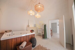 Shower, jetted bath, hair dryer, bidet