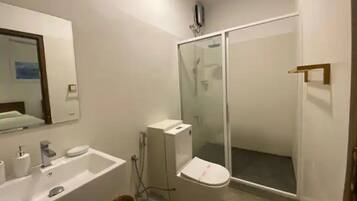 Hair dryer, towels, soap, shampoo