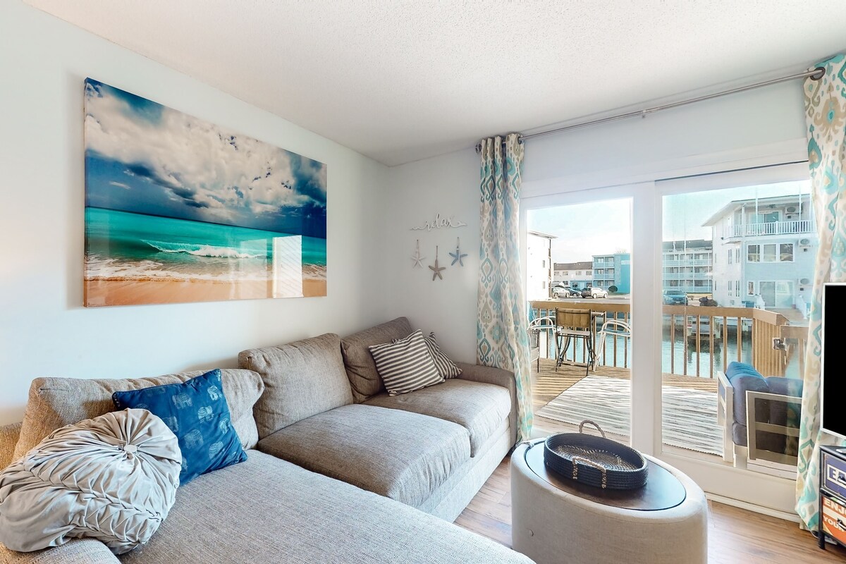 Waterfront condo with scenic balcony, games, fireplace, & W/D - dog-friendly