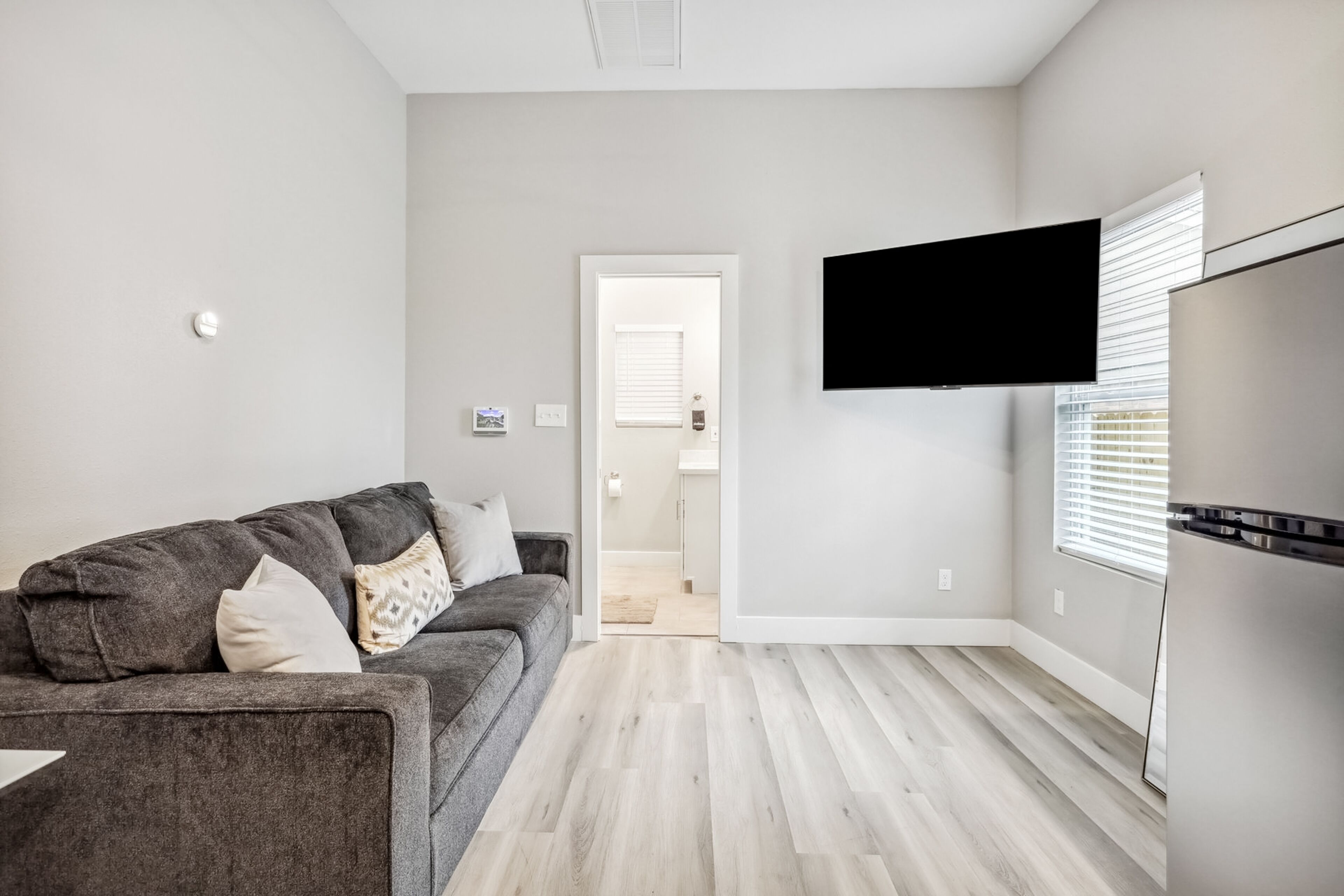Modernly updated stay with well-equipped kitchen, central AC, smart TV, & W/D