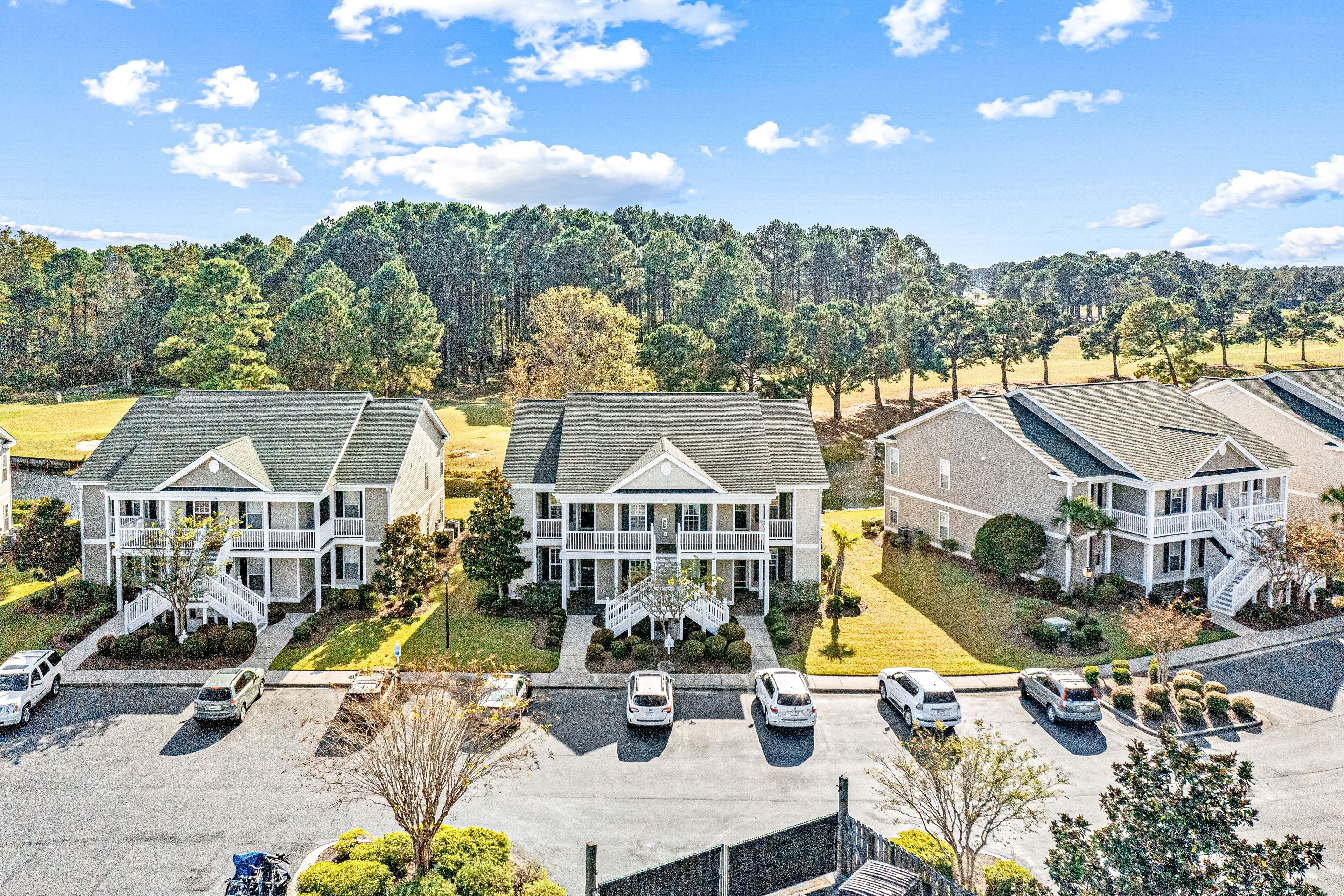 Sunny condo with pools, tennis, balcony & lake/golf views - near the beach