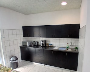 Fridge, microwave, coffee/tea maker, electric kettle