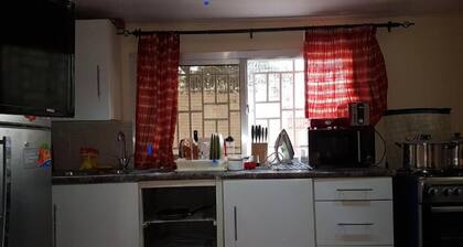 A cozy apartment in a quiet location .
5 minute drive to Lumley Beach.