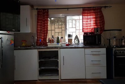 A cozy apartment in a quiet location .
5 minute drive to Lumley Beach.