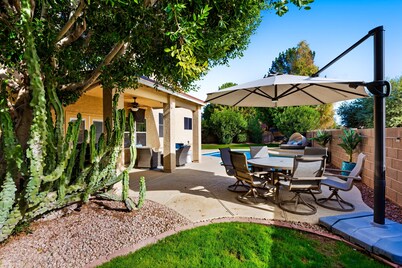 Spacious home with heated pool, wonderful backyard & great location