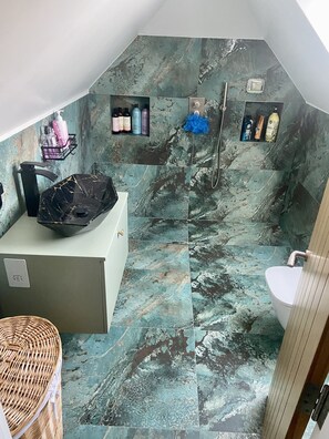 Shower, hair dryer, towels, soap