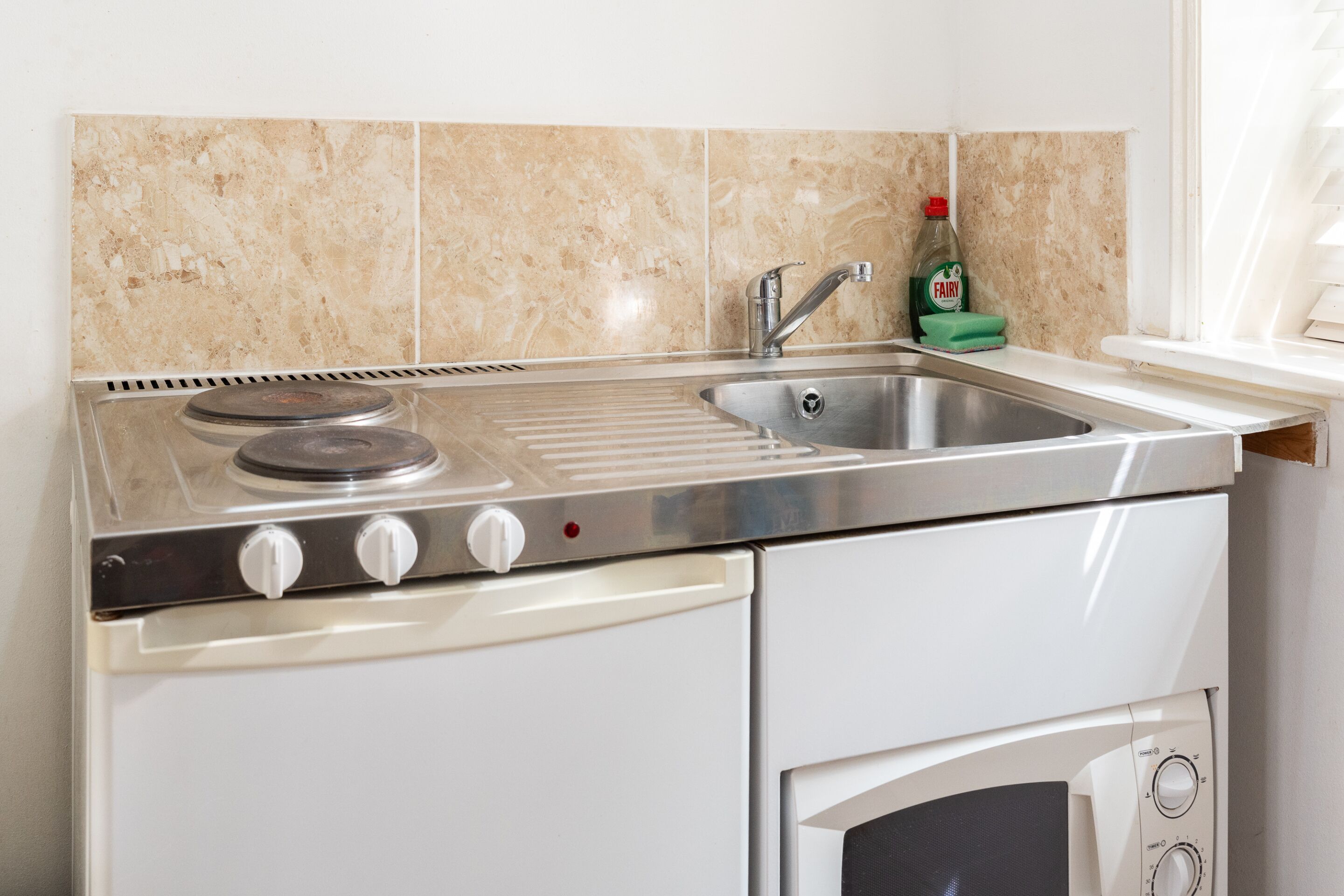 Fridge, microwave, electric kettle, toaster