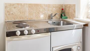 Fridge, microwave, electric kettle, toaster