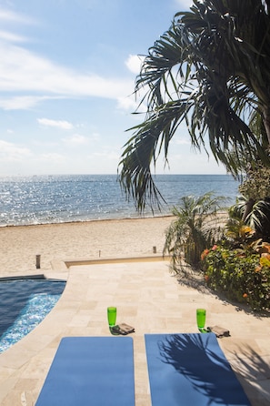 On the beach, sun loungers, beach towels