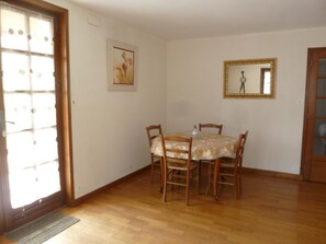 Enjoy meals in this cozy dining area with a round table and four chairs.