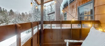 Ski getaway with pool, sauna, covered balcony, W/D access, & internet