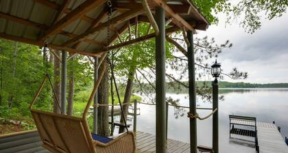 All-seasons lakefront cabin with dock, wood fireplace, kitchen, kayaks, & AC
