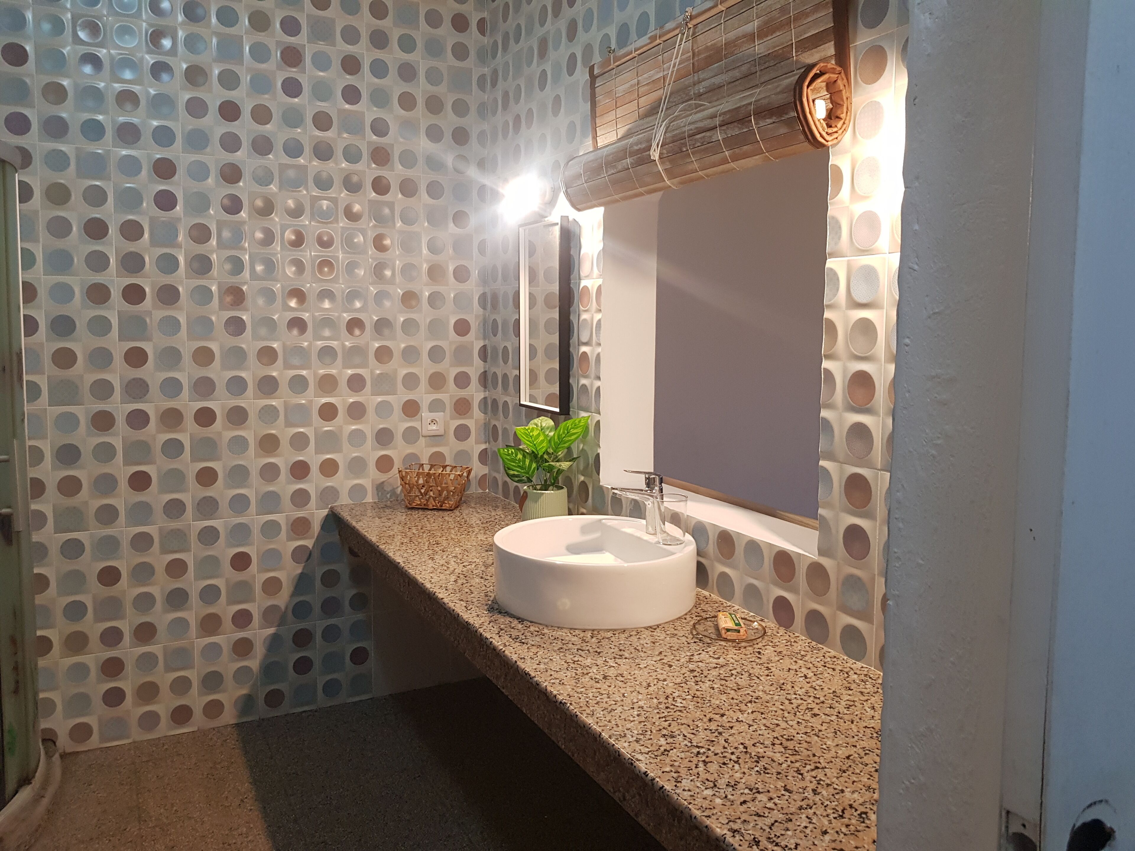 Separate tub and shower, rainfall showerhead, free toiletries