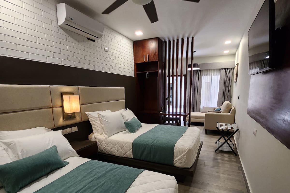 Family Room | 1 bedroom, down comforters, free WiFi, bed sheets