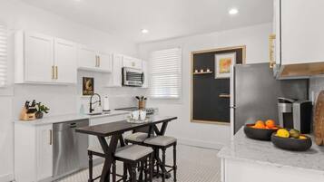 Coffee/tea maker, fridge, microwave, oven