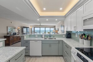 Fridge, microwave, oven, stovetop - Fresh & Light Oceanfront Condo (Key Colony Beach)
