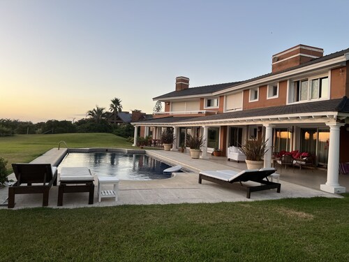 Beachfront home on Solanas Beach with sweeping views and a heated pool. 