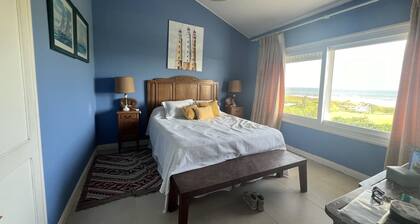 Beachfront home on Solanas Beach with sweeping views and a heated pool.