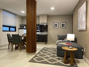 Deluxe-Apartment, Terrasse | Wohnbereich