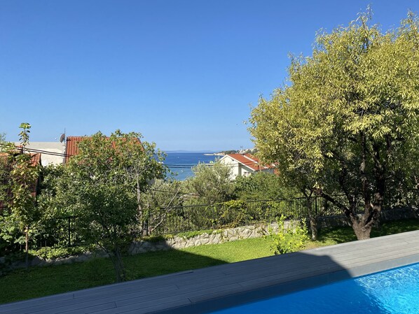 Outdoor pool, a heated pool - Great 4-bedroom villa w heated eco pool (Duce)