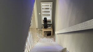 A staircase with a dog at the bottom. - Great 4-bedroom villa with heated pool (Duće)