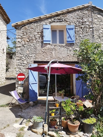 Property grounds. Pretty sunny village house with view and garden