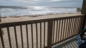 A wooden deck with a view of the ocean. - Toes In The Sand (North Topsail Beach)
