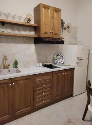 Fridge, stovetop, electric kettle, high chair