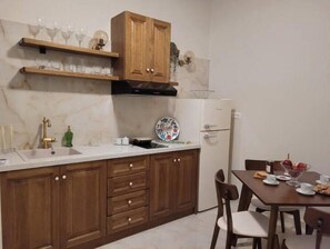 Fridge, stovetop, electric kettle, high chair