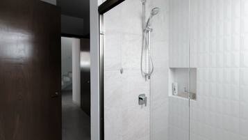 Shower, eco-friendly toiletries, hair dryer, towels