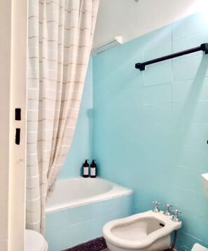 Hair dryer, towels, soap, shampoo