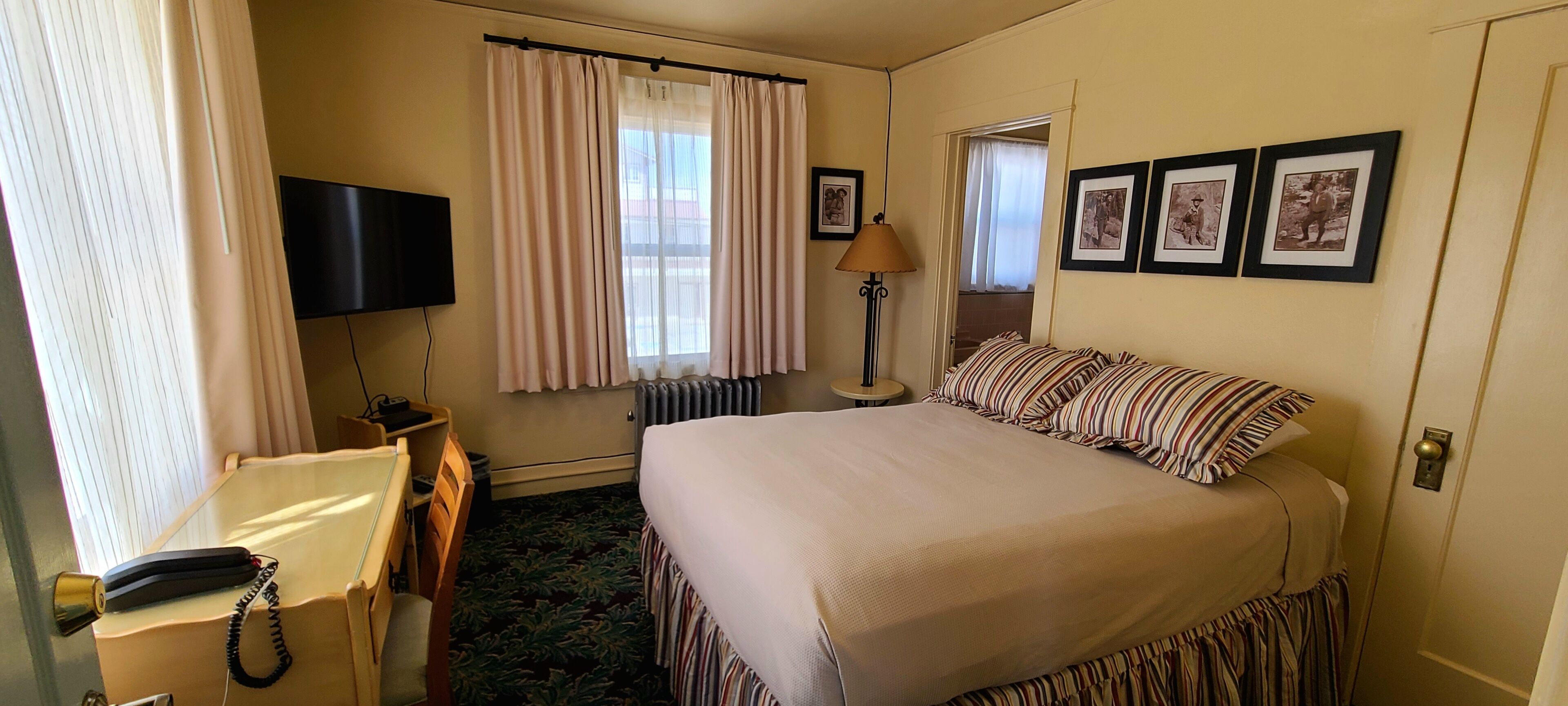 Habitación individual clásica | Escritorio, cortinas blackout y wifi gratis 