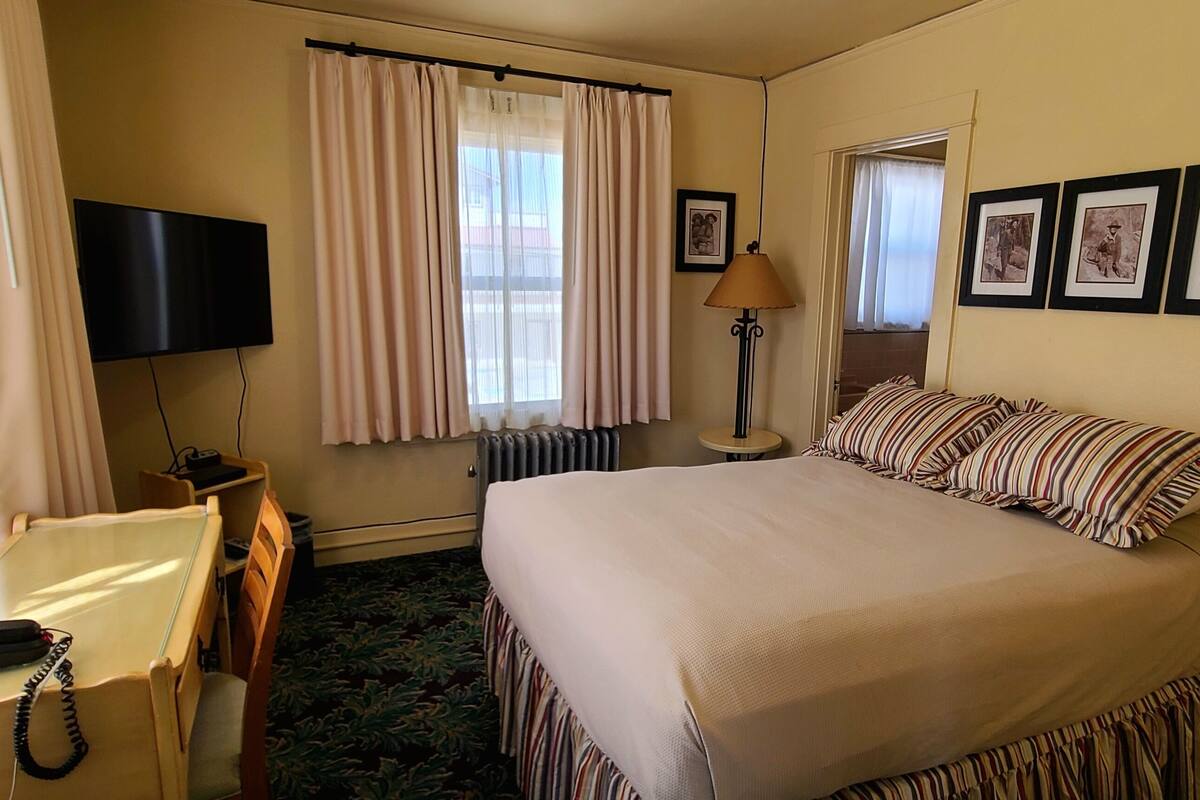 Habitación individual clásica | Escritorio, cortinas blackout y wifi gratis