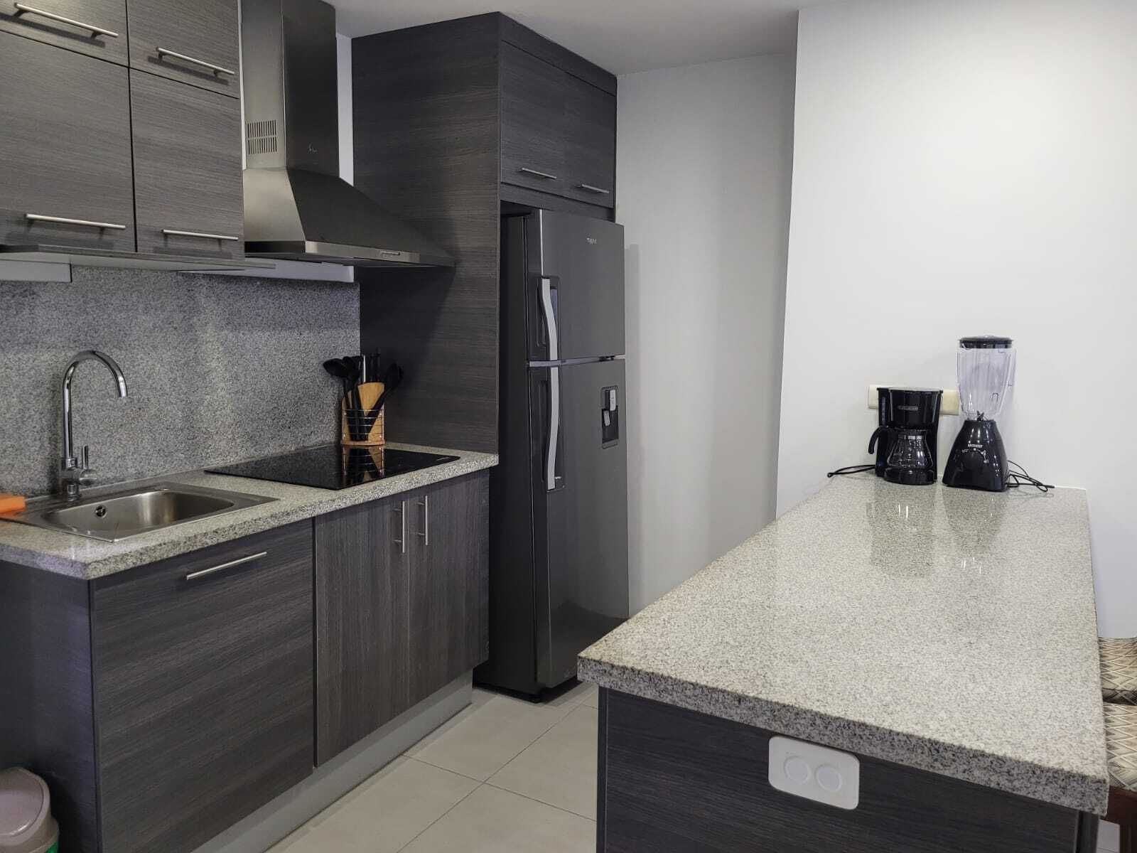 Fridge, stovetop, coffee/tea maker, toaster