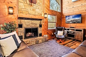 Smart TV, fireplace, table football, books