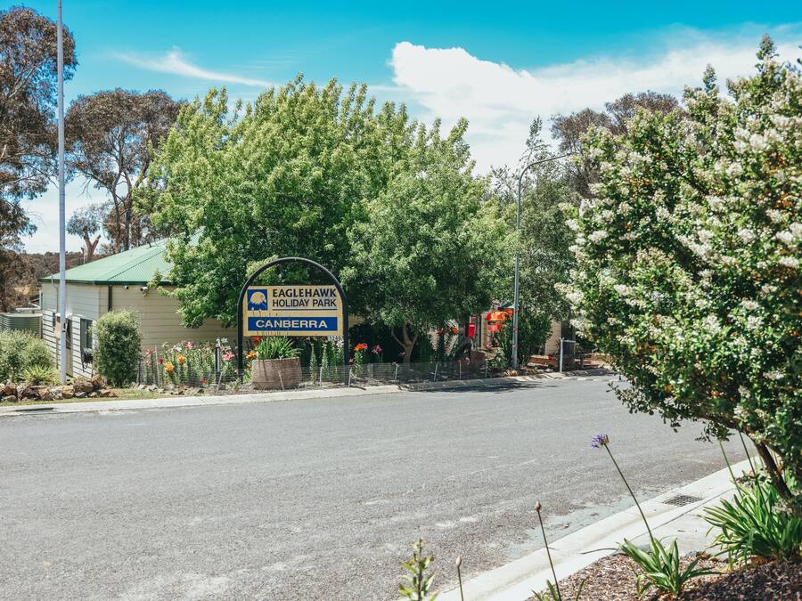 A road sign for Eaglehawk Holiday Park in Canberra.