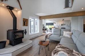 Smart TV, fireplace, table football, computer monitors