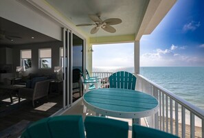 Outdoor dining - Salt Life: Experience Coastal Luxury, 2BR KCB Condo W/ Breathtaking Ocean Views, Shared Pool & Beach (Key Colony Beach)