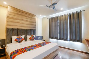 华丽客房 | 埃及棉床单、高档床上用品、客房内保险箱、免费 WiFi