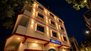 A multi-story building with a sign for 'Vairagi Inn' and 'Fab Hotels' indicating a hotel property. - FabHotel Vairagi Inn - Nr. Bhojuveer Chauraha, Shivpur (Varanasi)