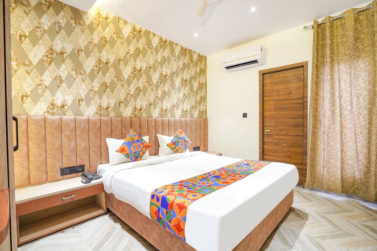 Deluxe kamer | Lakens van Egyptisch katoen, luxe beddengoed, een kluis op de kamer