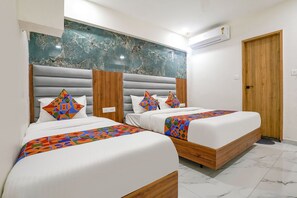 Egyptian cotton sheets, premium bedding, in-room safe, free WiFi - Fabhotel Amantra (Gandhinagar)
