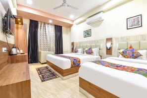Family Room | Egyptian cotton sheets, premium bedding, in-room safe, free WiFi - Fabhotel Golden Palms (Udaipur)